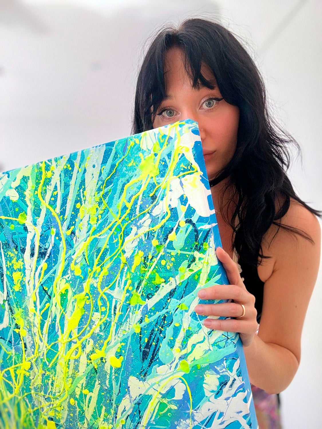 Bridget Bradley Abstract Artist Holds Original Painting Luminescence. Beautiful bVibrant Textured Art With Neon. Learn more