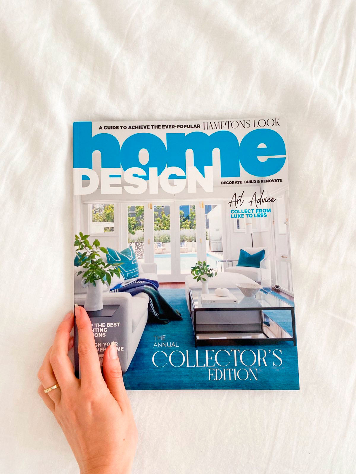 Image of Bridget Holding Her Copy of Home Design Magazine Issue 26.2