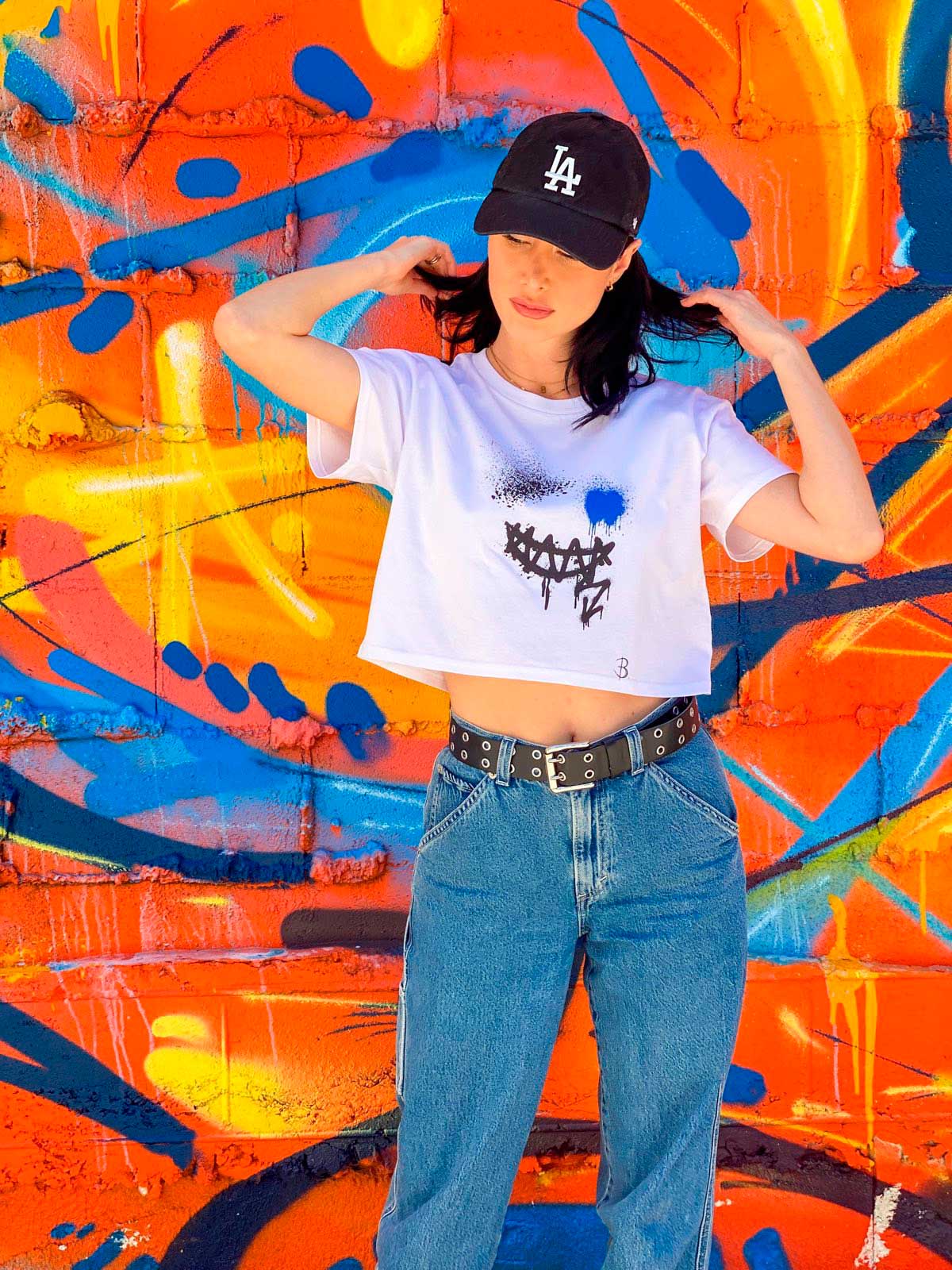 Bridget Wears her designer white Smile Crop Top Tee With Jeans B-Contemporary-Streetwear