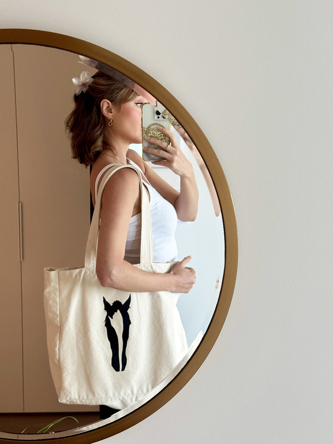 Bridget models the 'A Horse's Soul' premium canvas tote bag with her horse head art print.