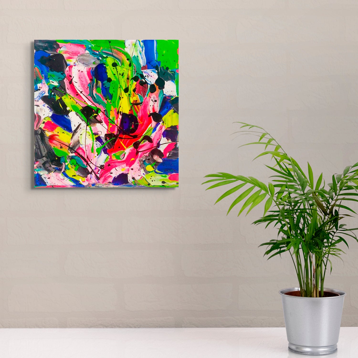 'City Days' original abstract painting on canvas, unframed hanging above bench with pot plant. Textured, vibrant art by Bridget Bradley