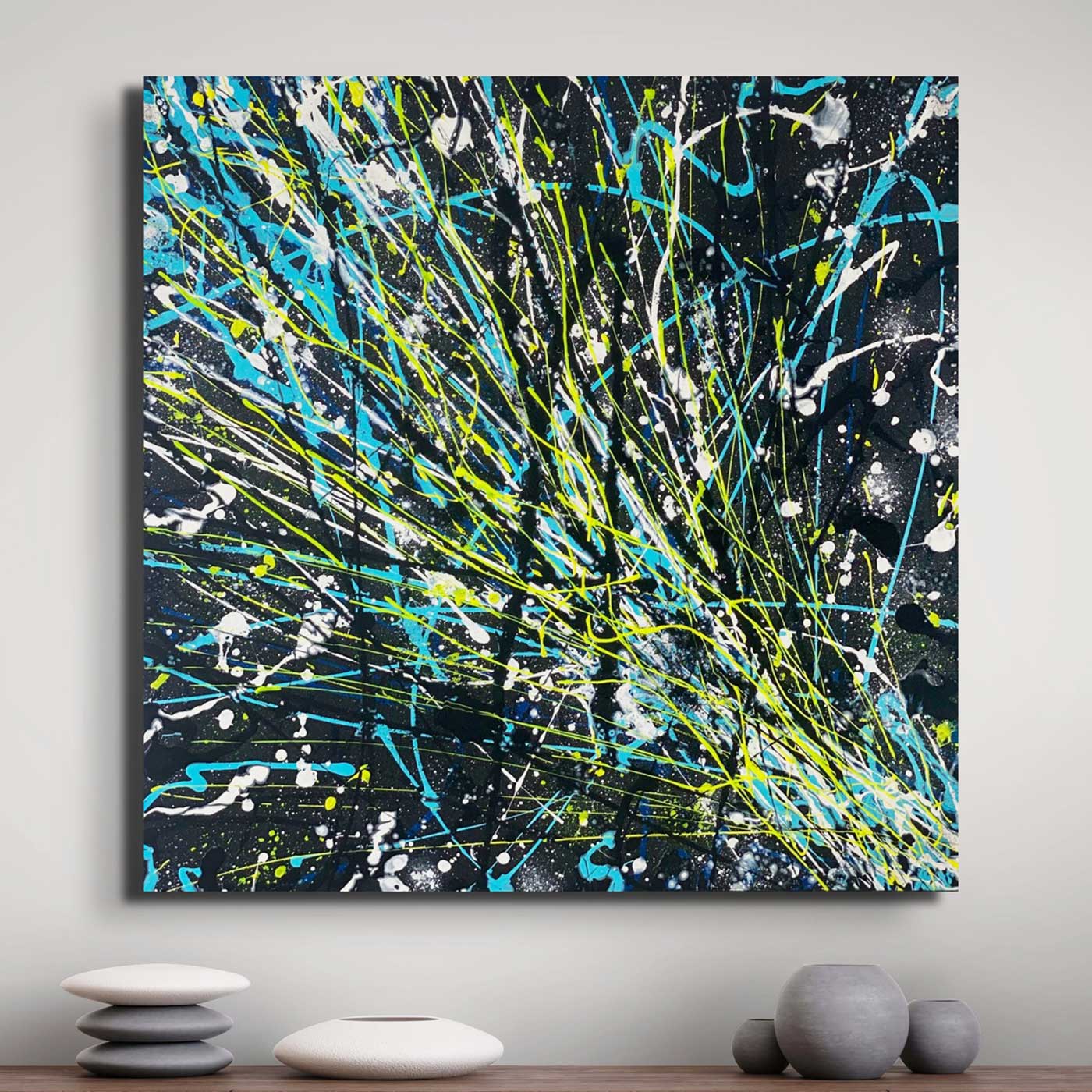 'Comet' Original Abstract Painting on Canvas by Bridget Bradley, seen Unframed Hanging Above Stone Ornaments.