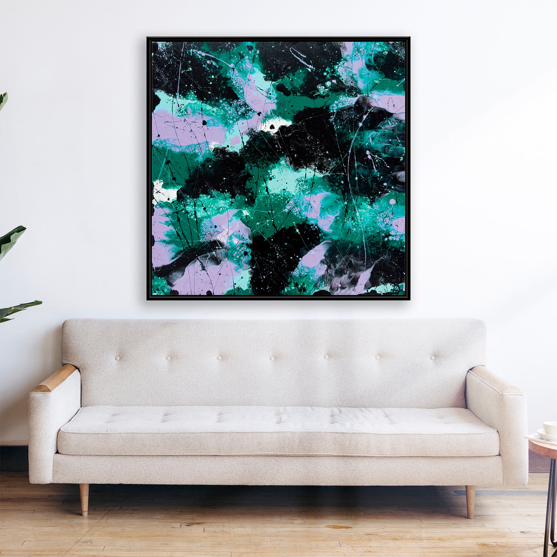Fine Art Abstract print, 'Forest I' by Bridget Bradley on a wall above a white sofa in a room.