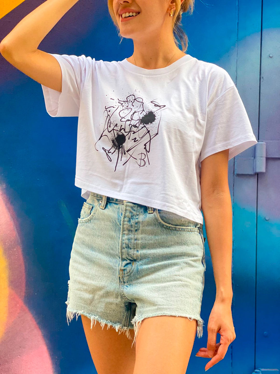 Model Wears The Eva Crop Top Tee Closeup Of Front Design-B-Contemporary Streetwear designed by Bridget-Bradley