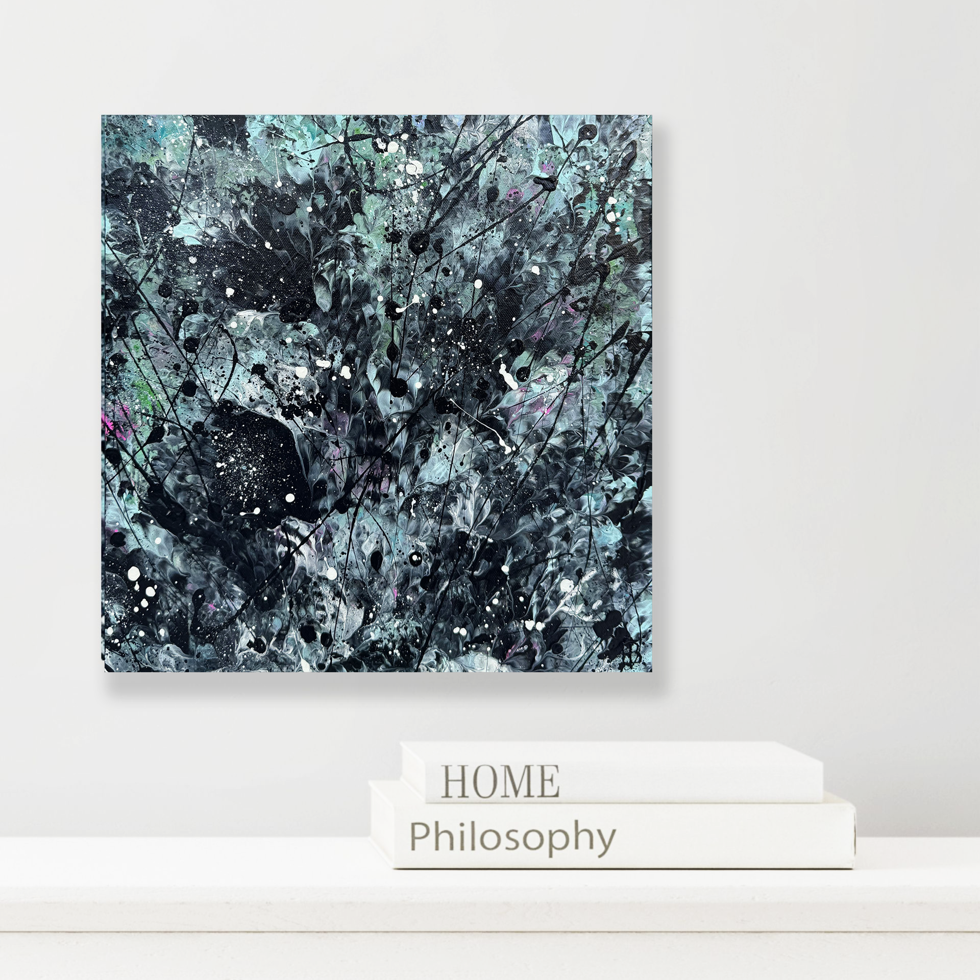 Rockpool I - Original textured abstract expressionism painting gallery wrap canvas hanging on off white wall above white books. Painting colours are in aqua, charcoal and touch of hot pink and white. Created by Bridget Bradley.