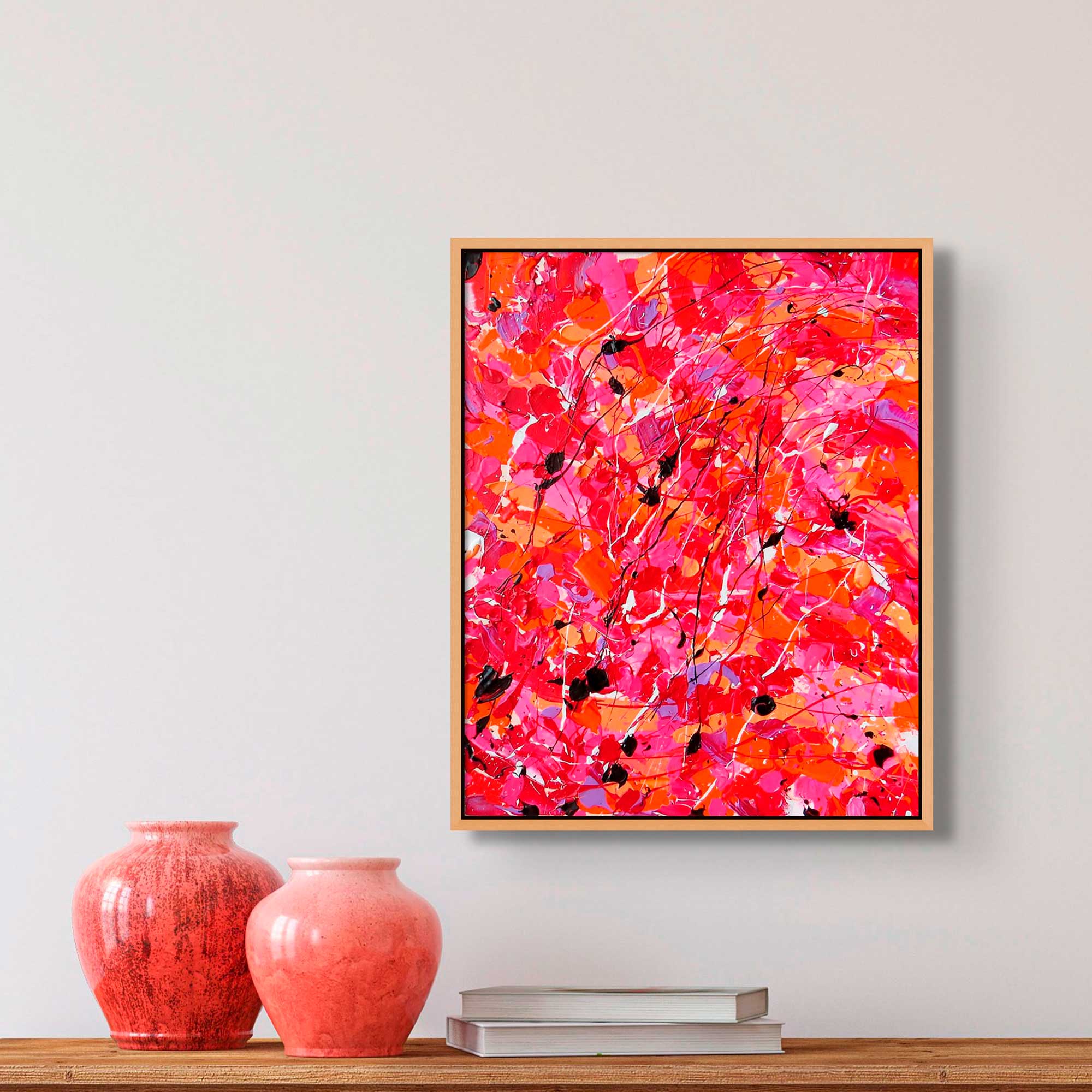 Sunset Desert, Original abstract expressionist painting on canvas by Bridget Bradley, seen in situ wiht oak frame above wooden console book and orange vases.