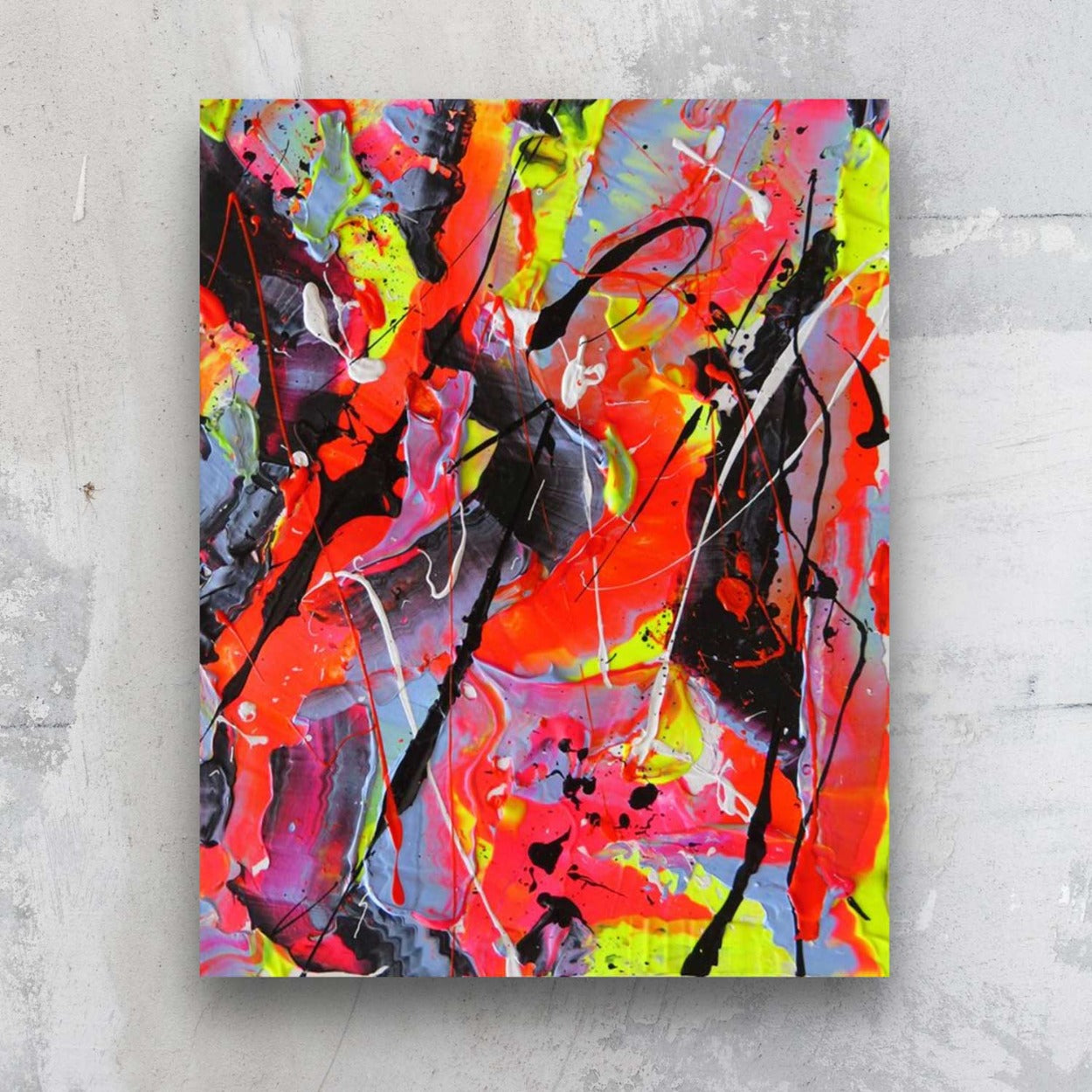 Little Luxuries IV, original abstract painting by Bridget Bradley, in vibrant colours and neons,seen against a stone wall