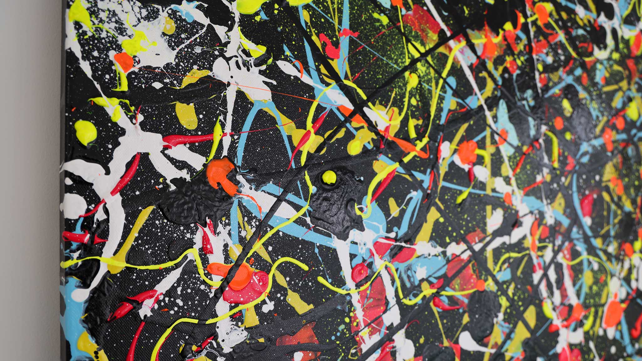 Close Up of 'Onyx' original abstract expressionism painting in bold and bright colours on black. Heavily textured. Artwork by Bridget Bradley