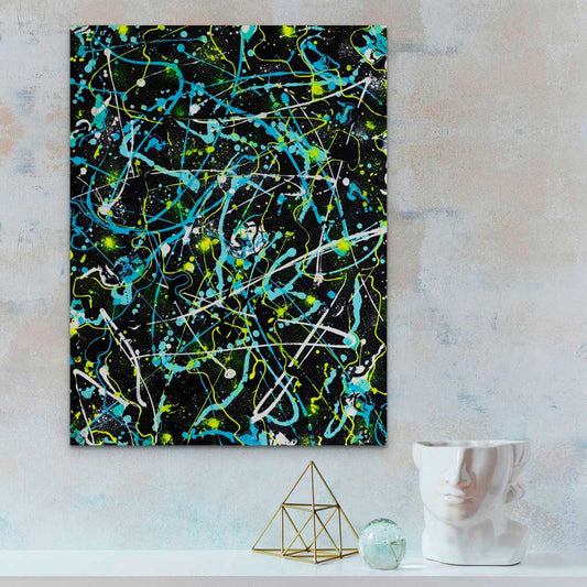 'Alien' abstract canvas art in brilliant neon yellow, blues , white marks on black background seen in situ. Abstract artwork by Bridget Bradley
