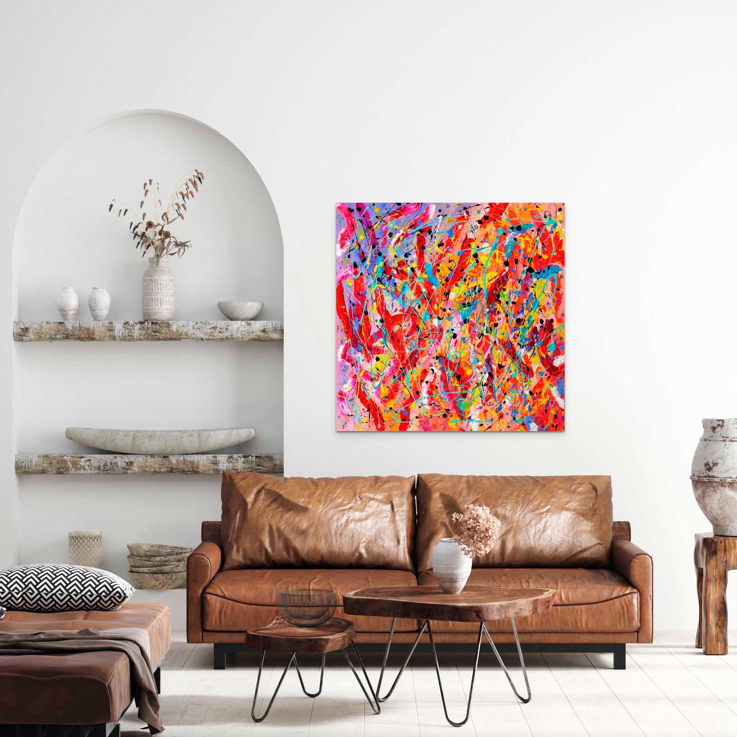 Alive, original abstract art on canvas seen hanging in situ in living room above tan leather sofa. Artwork is one of a kind on canvas by Bridget Bradley Abstract Artist