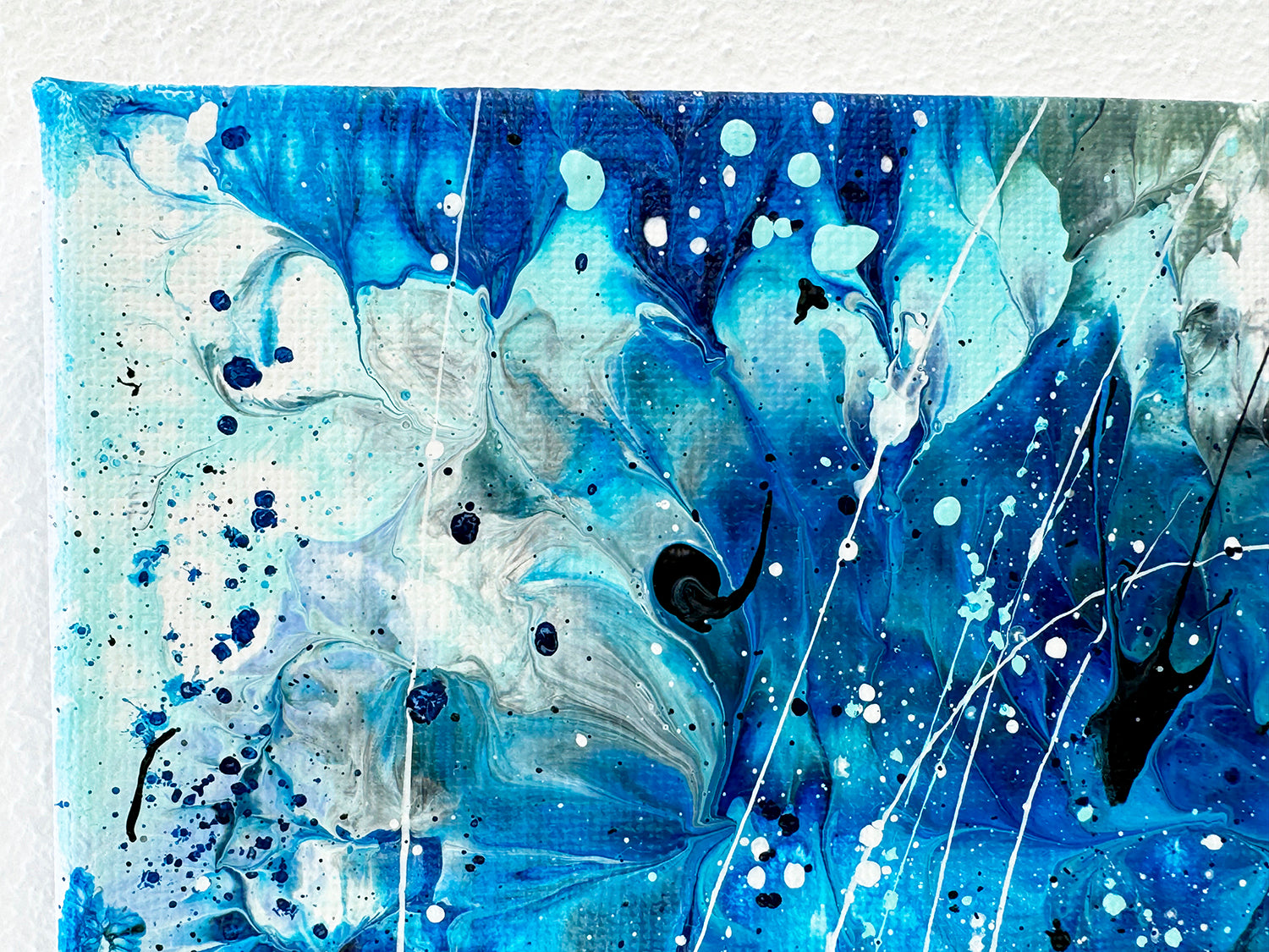 Top edge of AZURE WATERS I' painting on canvas without frame. Textural and layering effects in blues white and dark hues. Learn more about this contemporary artwork by Bridget Bradley, Brisbane and Sunshine Coast Australia