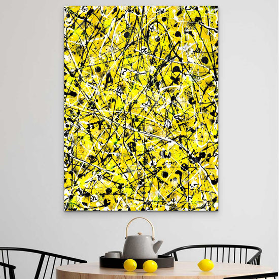 Image of 'BEEHIVE' a large, original abstract expressionism painting on canvas, in yellows, neon yellow, white and black colours with texture. Seen here without external frame hanging above dining table.Artwork by Bridget Bradley 