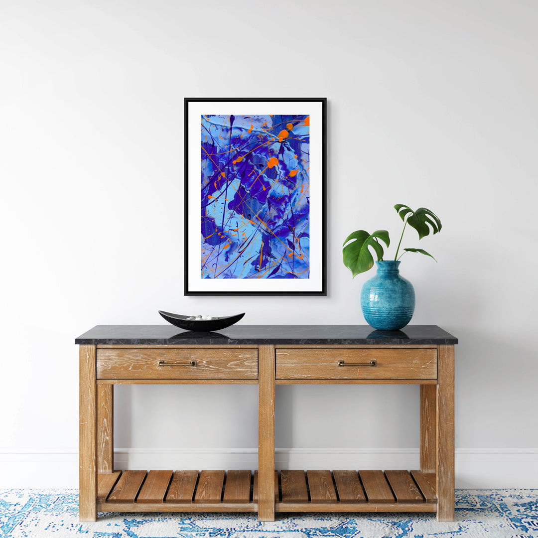 'Blue I' Art Print on Paper framed in Black Shadow Box Frame and seen hanging above a wooden console with objects. After the original painting on paper by Bridget Bradley