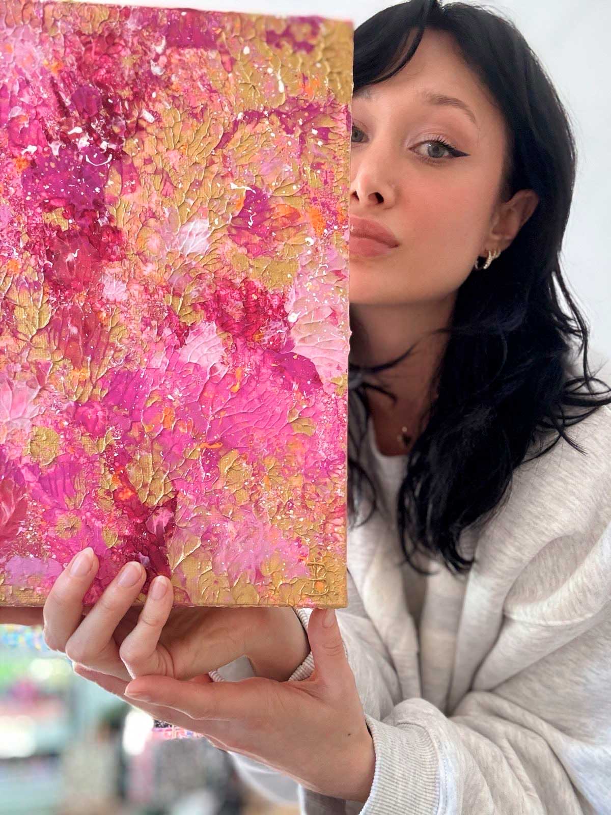 Bridget Bradley Holds Her Original Abstract 'Golden Hour I'  in Pink and Golden Hues