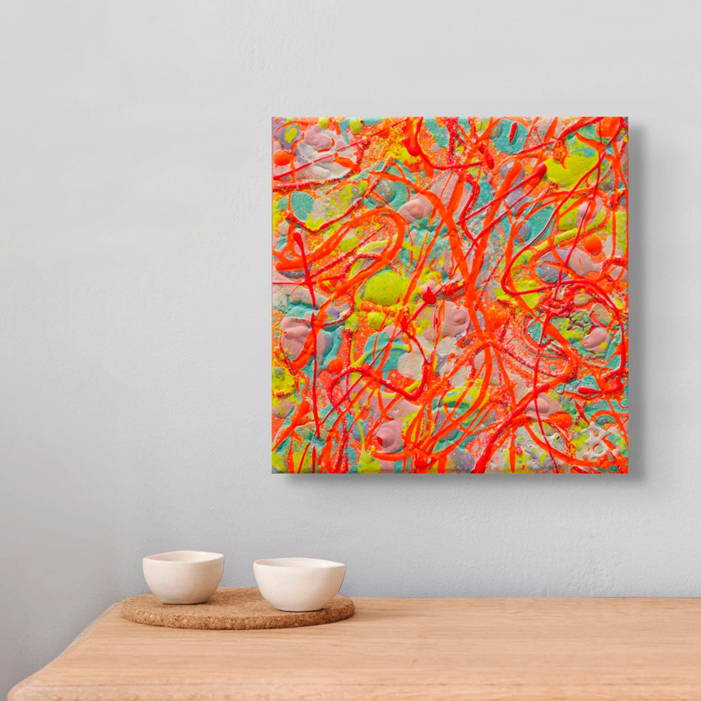 'Bright', an Abstract Painting on Canvas in bright neons and pastels seen hanging above bowls. Hand painted by Bridget Bradley, Abstract Artist.