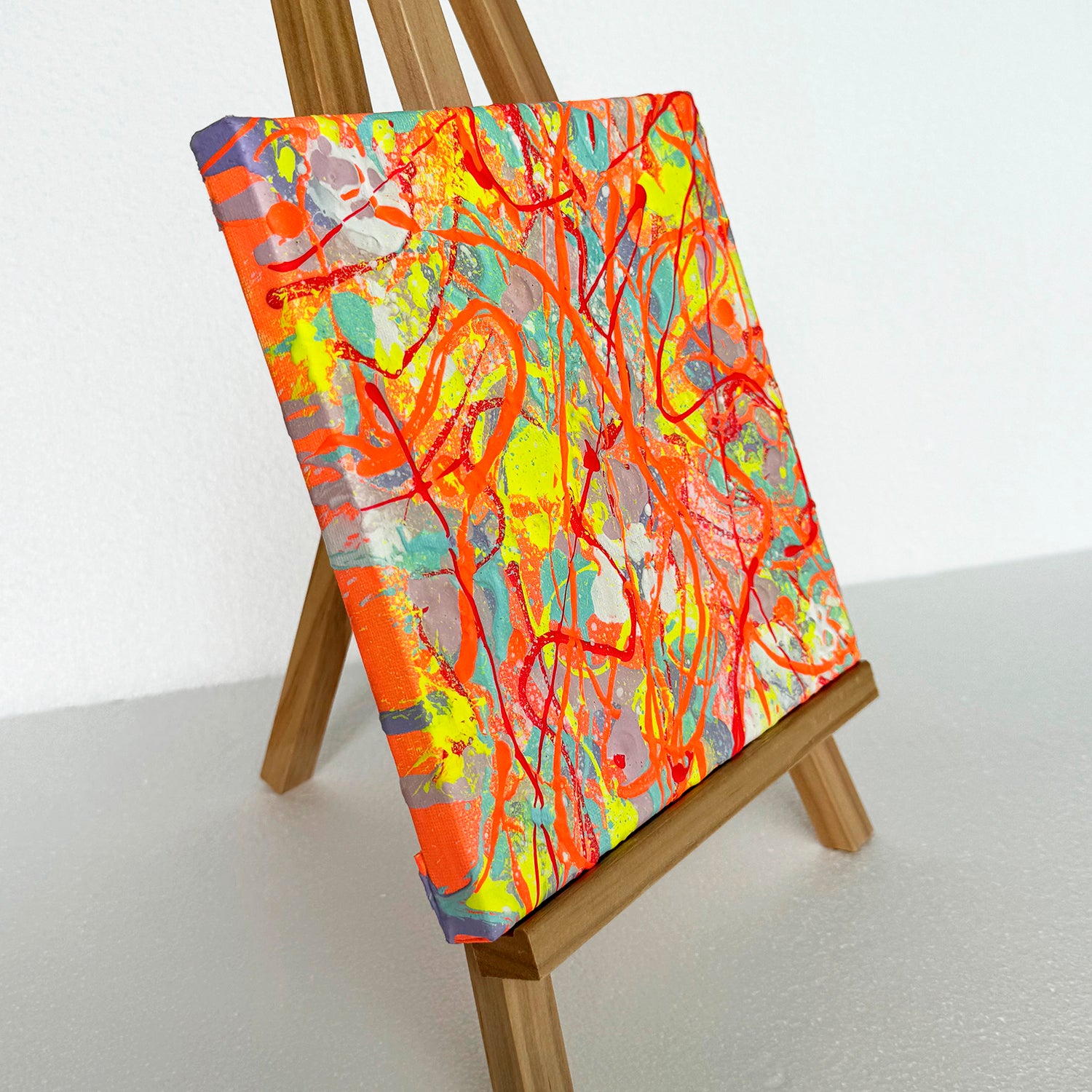 'Bright I' Original Painting in Bright Mini Series by Bridget Bradley Seen on Easel Right Canvas Edge