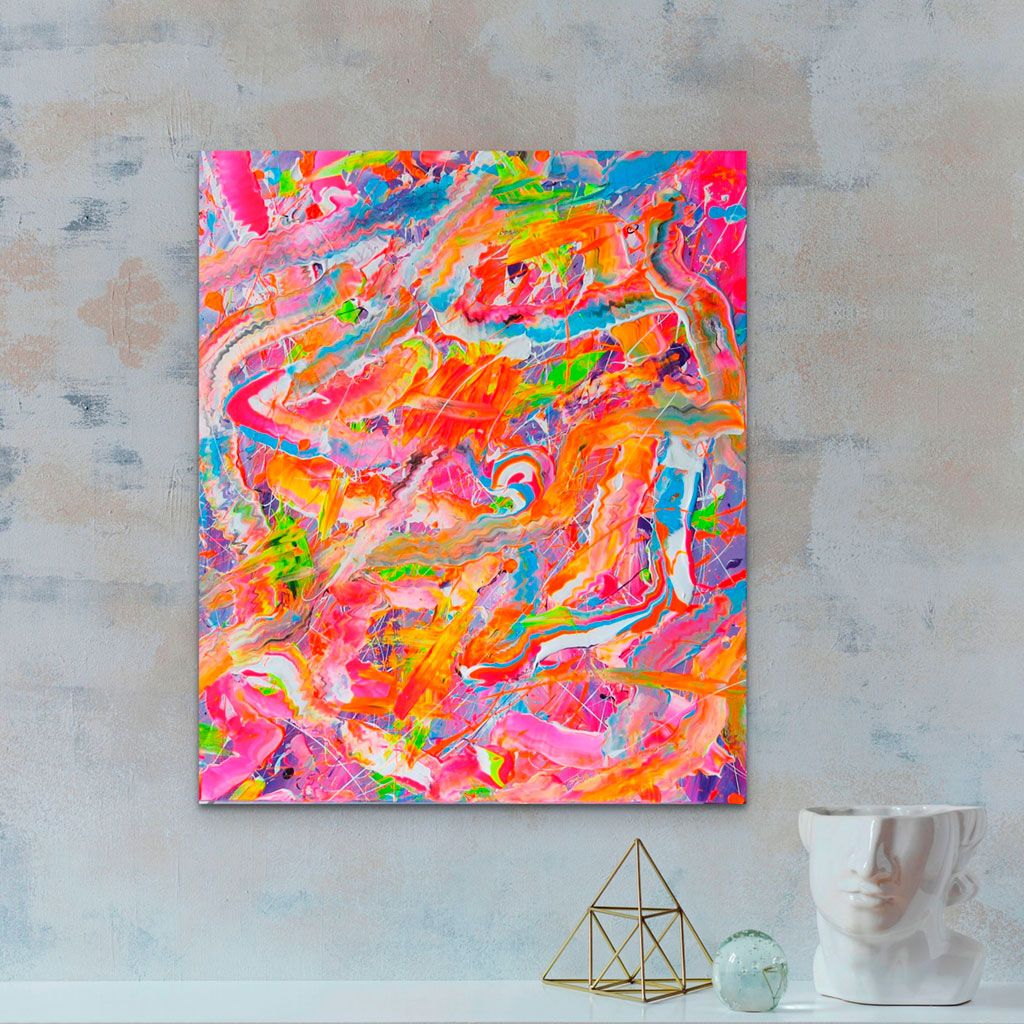 Candyland original abstract colorful painting in bright pastels and neons seen hanging in situ on concrete wall above ornaments. Artwork by Bridget Bradley