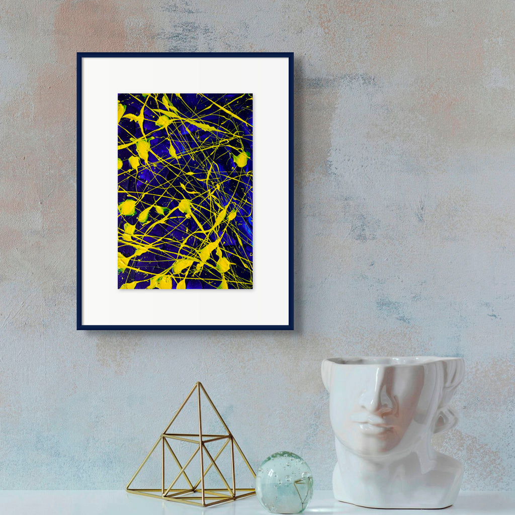 'Electric' original abstract seen framed in navy with white mat hanging above ornaments. textural, bold abstract painted by Bridget Bradley