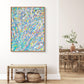 'Iridescence' original abstract expressionism painting on canvas by Bridget Bradley, seen in oak float frame above wicker table and baskets