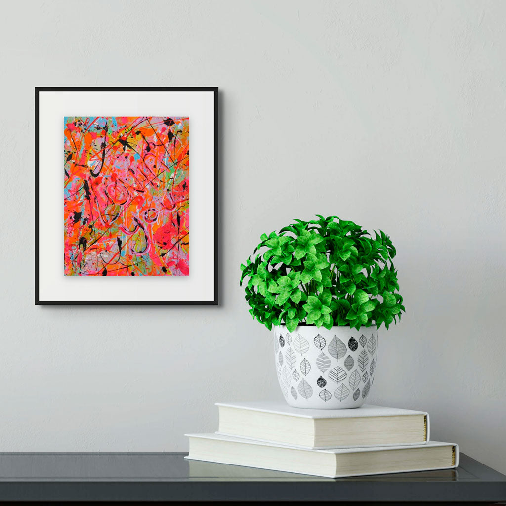 Lovin' You, original abstract on paper. heavily textured pop art style abstract seen with balck float frame hanging above a black desk with books and pot plant. Painted by Bridget Bradley