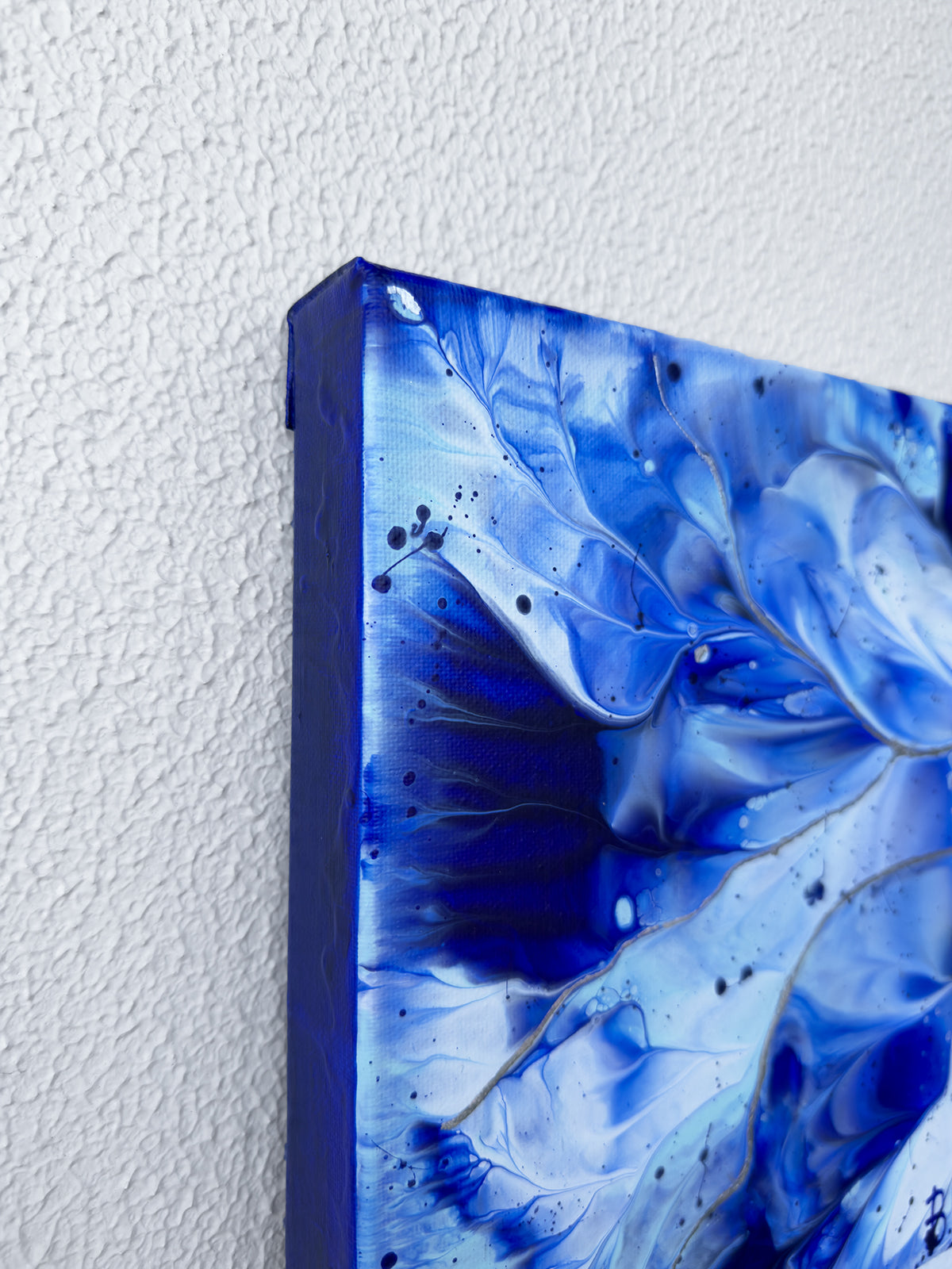 'Ocean Wings I' original abstract expressionism painting on canvas. Top right edge showing against white wall. Hand-painted by Bridget Bradley. Find out more about this vibrant piece.