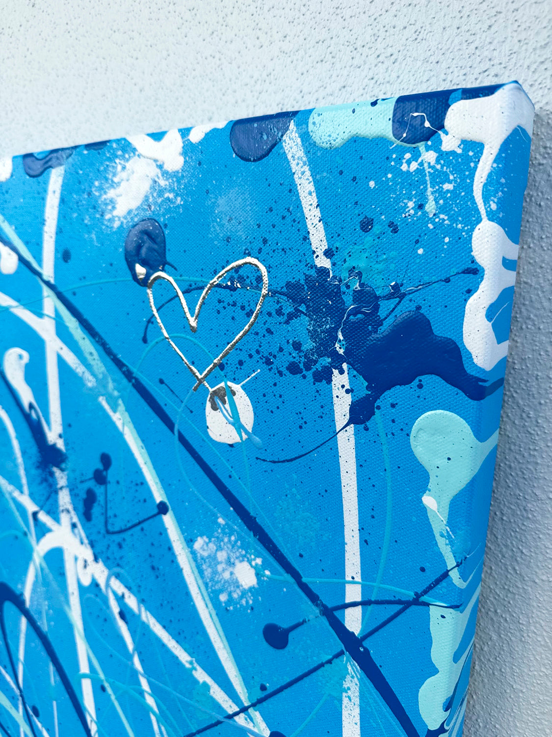 Top right edge of canvas of 'Something Blue' original textured abstract expressionism painting showing marks and silver leaf heart by Bridget Bradley. © Copyright Bridget Bradley