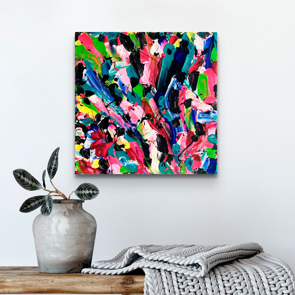 'Through The Glass' original abstract on canvas hand painted by Bridget Bradley, and abstraction of a stained glass window, in colorful. textured palette. Seen hanging in situ above grey vase and throw