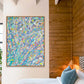 iridescence, original abstract expressionism painting  on canvas, in bright pastels with texture. Seen framed in oak float frame in bedroom. Painted by Abstract Expressionist Artist, Bridget Bradley