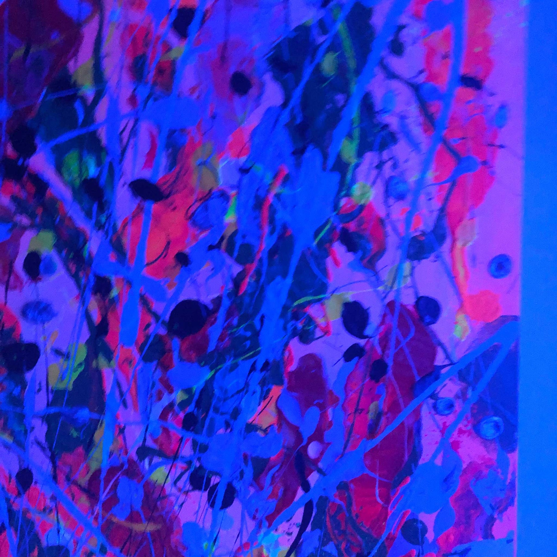 Part of the 'Alive' original painting seen glowing at night. Abstract, acrylic artwork by Bridget Bradley