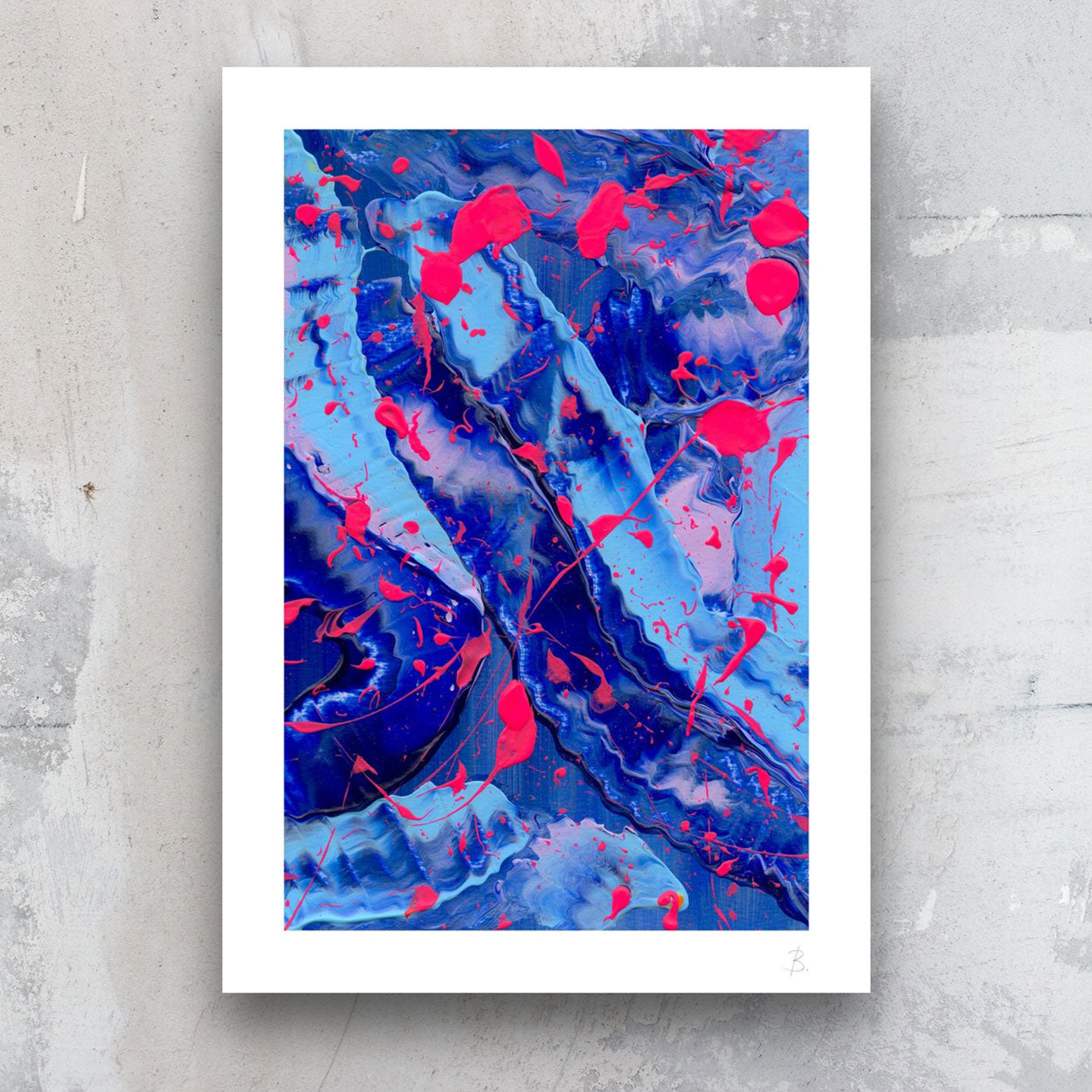 Blue III Art Print on paper in blues and neon pinks with white border,against stone wall. Bridget Bradley Abstract Prints