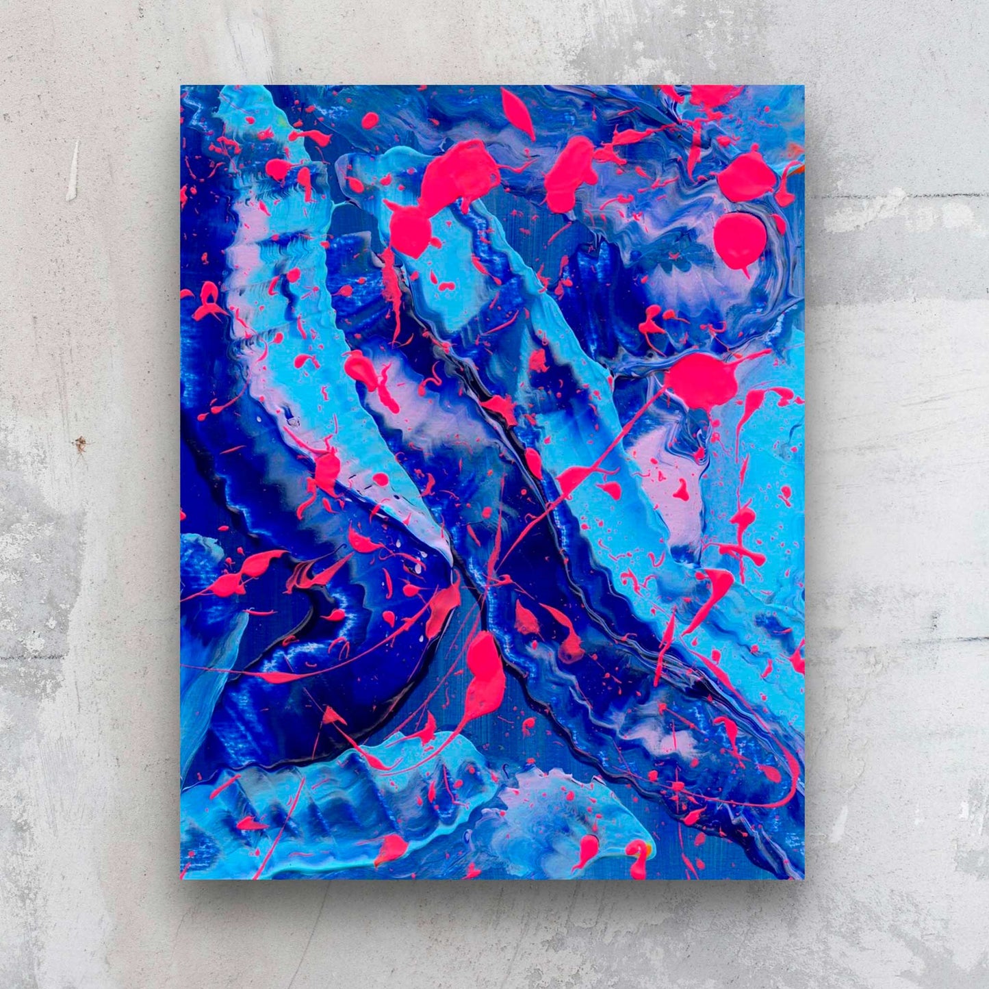 Blue III original, bold abstract painting seen against stone wall. Art by Bridget Bradley abstract expressionism artist. Palette of blues, pink and hot pink marks.