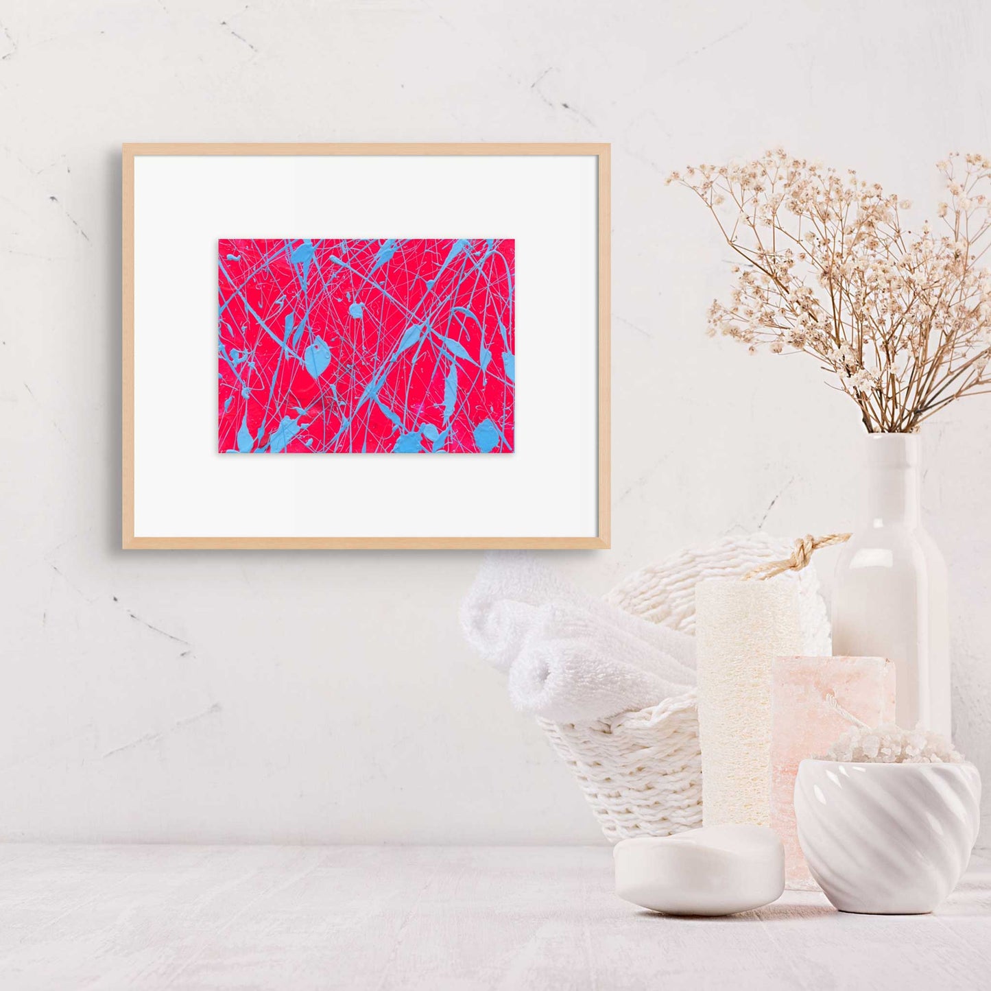 Clear Emotions, original abstract painting in bright pinks and sky blues by Bridget Bradley. Artwork seen framed in oak in situ in spa setting.