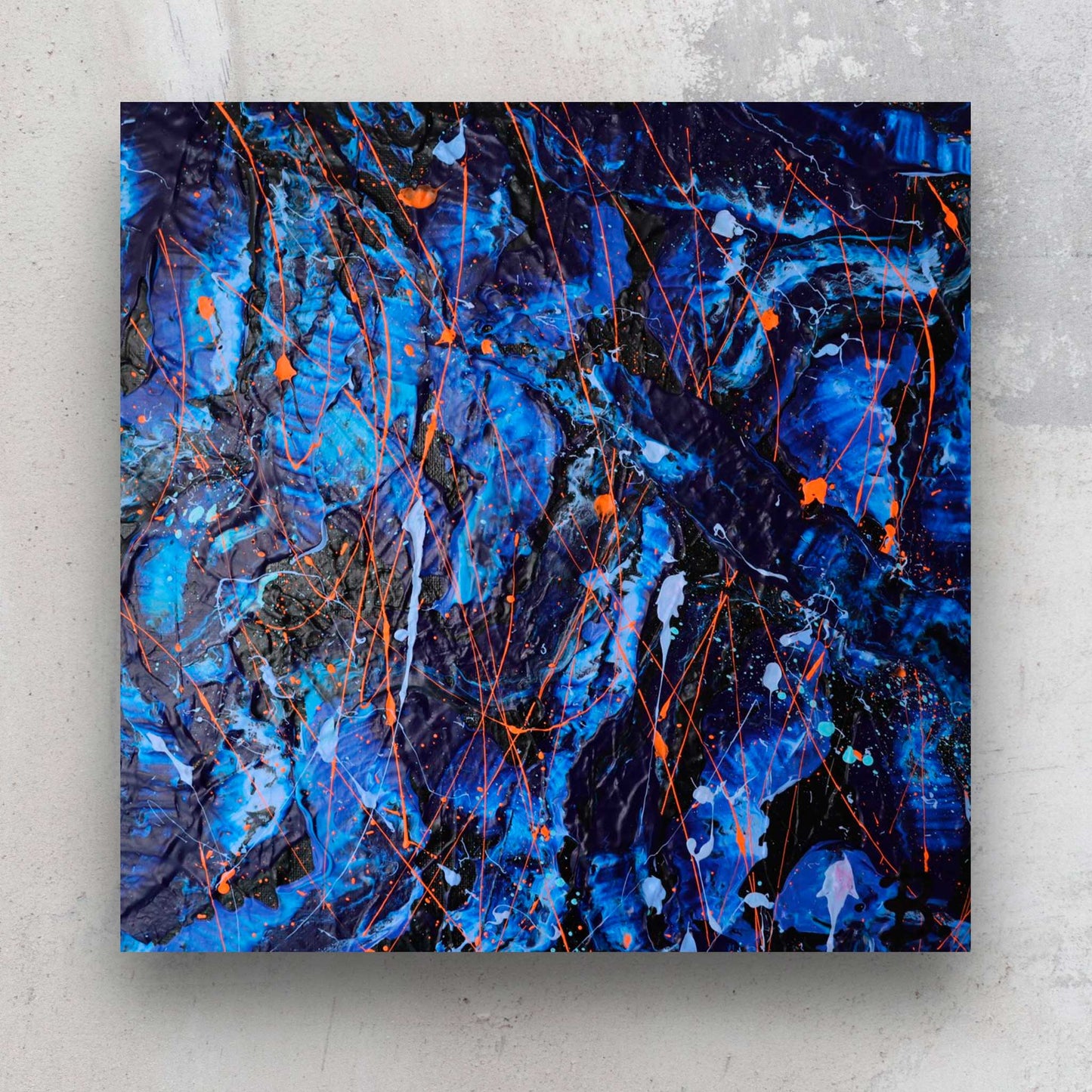 Enigma hand painted heavy texture abstract in blues, black with neon orange marks. Commissioned artwork 2023