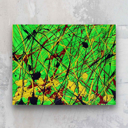 Jungle, original art on paper by Bridget Bradley, Bright Green with yellow, deep red and black marks. Action painting seen against a stone wall.