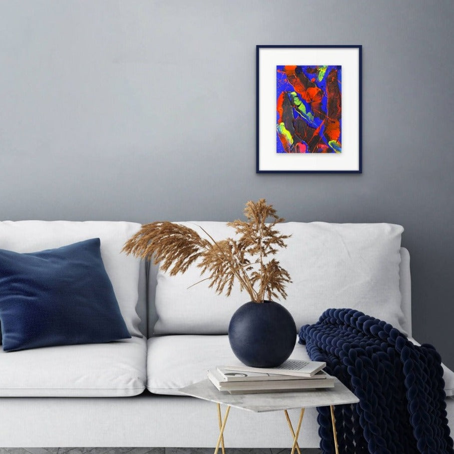 Little Luxuries XI, original art seen framed hanging in blue and white interior. Part of an art series painted by Bridget Bradley