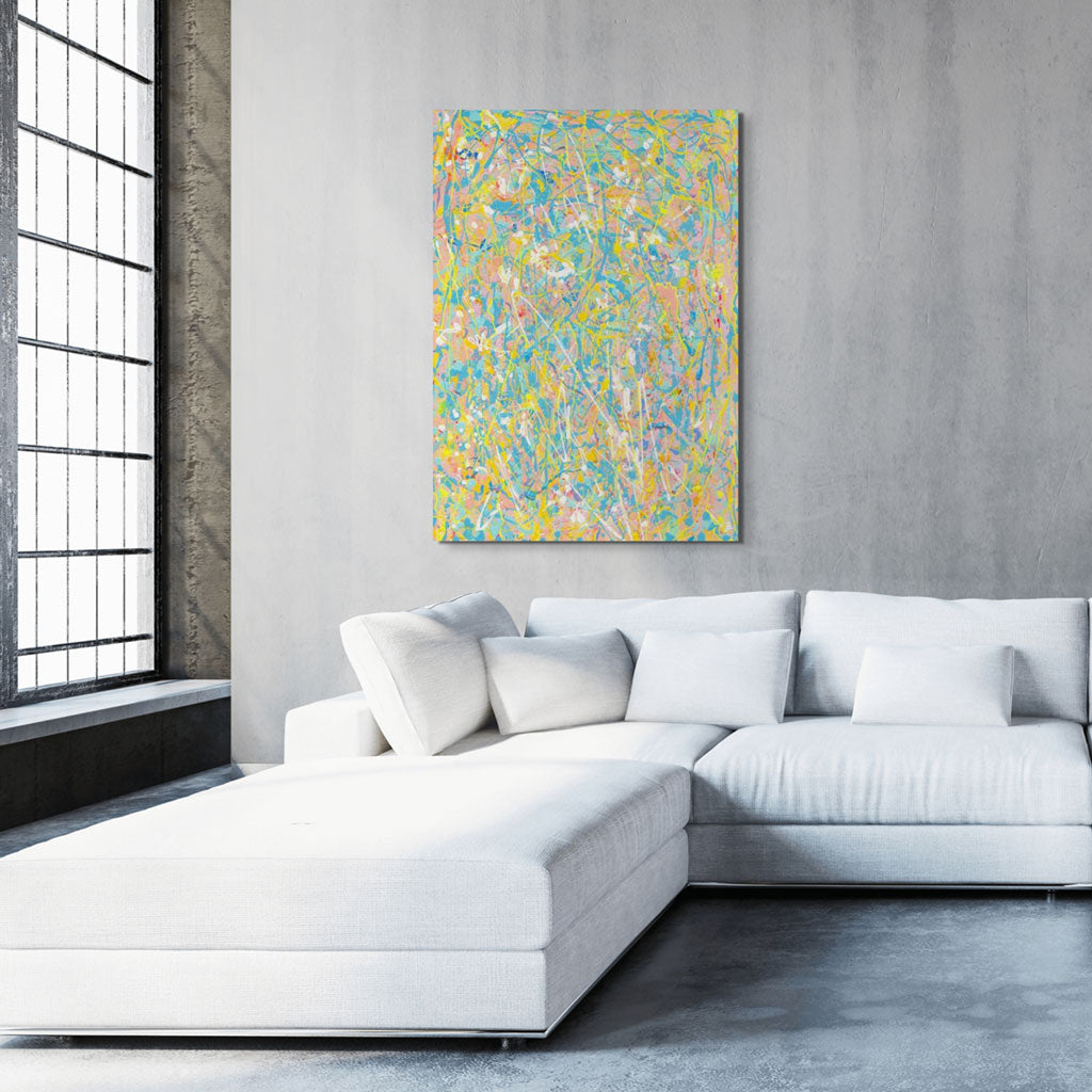 Naked large abstract on canvas in bright pastels and neon with texture seen hanging on concrete wall in modern  living room. Original painting by Bridget Bradley.