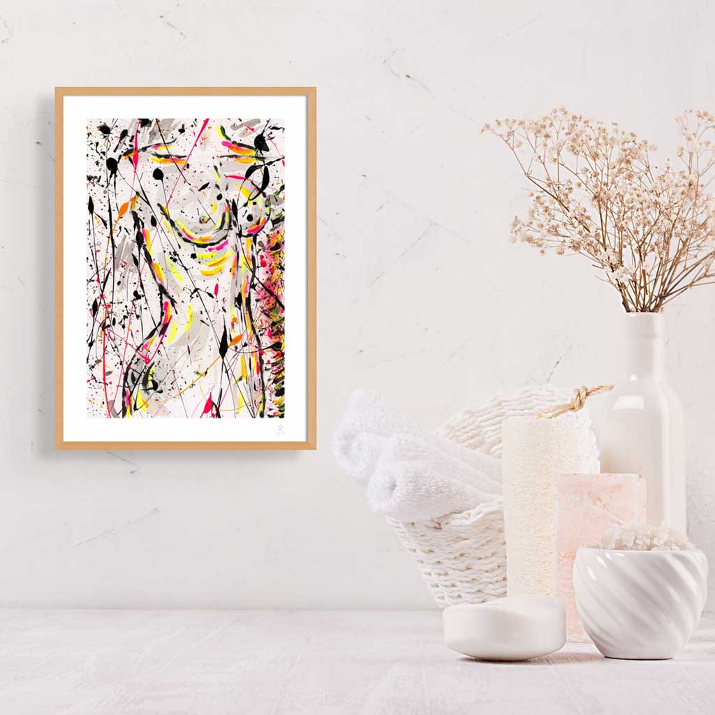 Nude I, fine art print seen framed in oak in situ with white  vase, basket and towel.