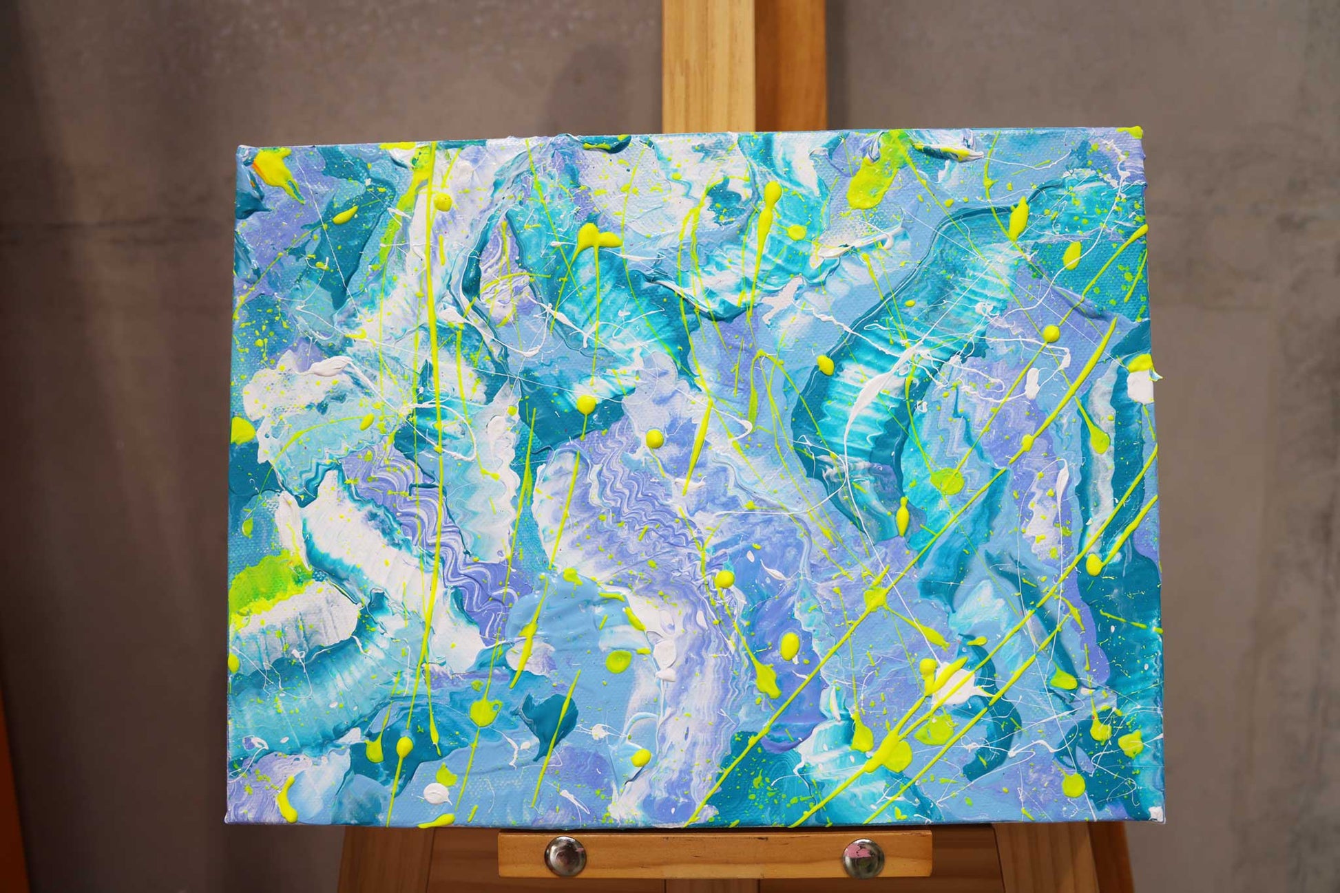 'Ocean' original abstract painting displayed on woden easel. Artsits, Bridget Bradley.