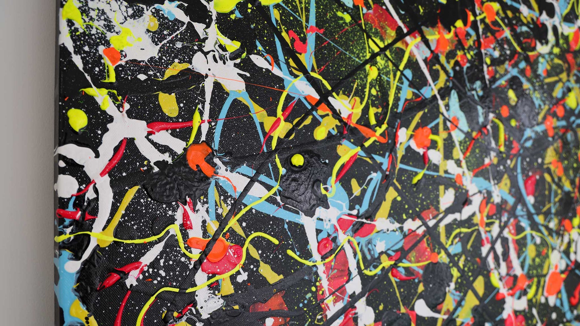 Close Up of 'Onyx' original abstract expressionism painting in bold and bright colours on black. Heavily textured. Artwork by Bridget Bradley