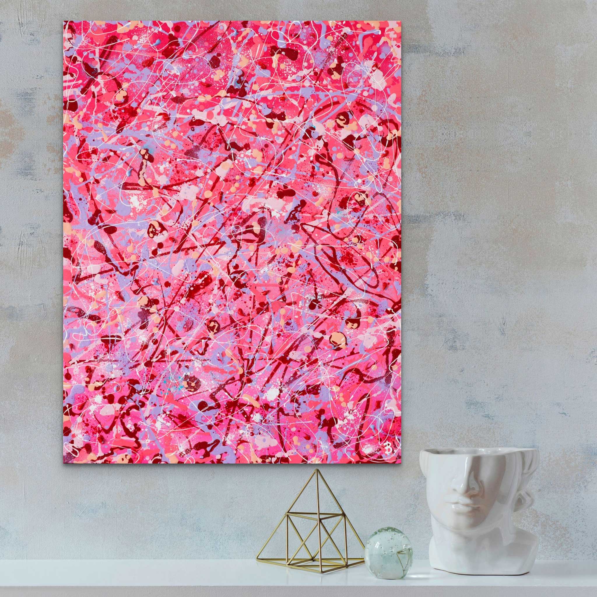 'Self Love', large, acrylic abstract painting seen hanging on stone wall with ornaments. Painted by Abstract Artist, Bridget Bradley, Australia