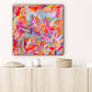 Sugar Fix hand painted abstract on canvas seen hanging in situ above wooden console. Brightly colored in pinks oranges, yellows, blues. Textured abstract by Bridget Bradley