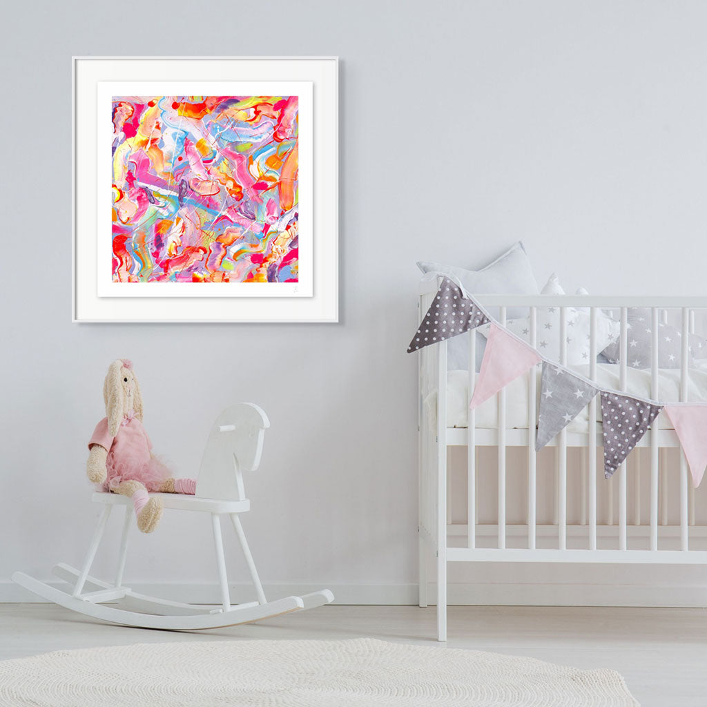 'Sugar Fix' abstract art print on paper colourful print in white box frame hanging on wall in a child's room. After original art by Bridget Bradley